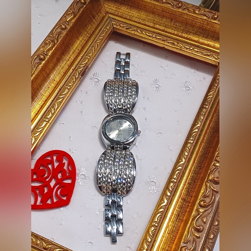 Womens watch by DUN with clear rhinestones